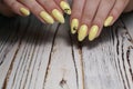 Fashionable yellow manicure