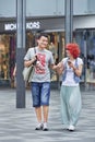 Fashionable young couple in shopping area, Beijing, China