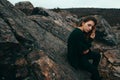 Fashionable young girl with messy hair in sweater outdoor Royalty Free Stock Photo