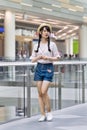 Fashionable young girl in a shopping mall, Beijing, China