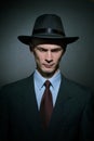 Fashionable young man detective in a stylish hat Royalty Free Stock Photo