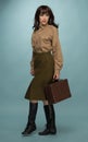 Fashionable Young Woman Carrying Suit Case Royalty Free Stock Photo