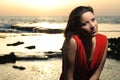 Fashionable young woman on a scenic beach vacation