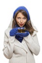 Fashionable young woman sipping hot tea Royalty Free Stock Photo