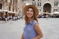 Fashionable young woman visiting the city of Verona in Italy in her cultural tour in Europe