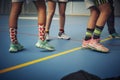 Fashionably dressed girls at halftime of a basketball game