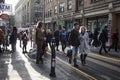 Fashionably-dressed people walk along Brick Lane on a Sunday Royalty Free Stock Photo