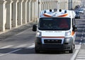 Fast ambulance runs to the city street during a Medical Emergency Royalty Free Stock Photo