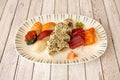 Fast assorted sushi tray with prawn nigiri and butterfish, uramaki califorinia