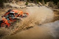 Fast ATV and UTV driving in mud and water. Quad racing, ATV 4x4 Royalty Free Stock Photo