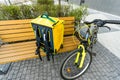 Fast bicycle courier. big yellow bag and bicycle