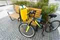 Fast bicycle courier. big yellow bag and bicycle