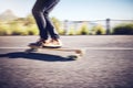 Fast, blur and legs of a man on a skateboard in street for exercise, training and travel in Australia. Fitness, sports