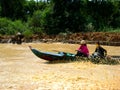 Fast boat on the muddy waters