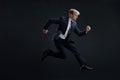 Fast business. Running businessman in business suits, concept