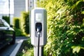 Fast charging stations for electric vehicles on a city street. Charging station for cars with illumination. Available charging for
