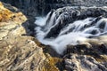 Fast, Cold Runoff Waterfalls in the Rocky Mountains Royalty Free Stock Photo