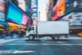 Fast delivery white truck travelling through the city streets Royalty Free Stock Photo