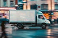 Fast delivery white truck travelling through the city streets Royalty Free Stock Photo