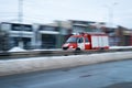 Fast driving fire truck in a city Royalty Free Stock Photo