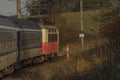 Fast electric train with coaches from Brno to Plzen in spring morning