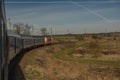 Fast electric train with coaches from Brno to Plzen in spring morning