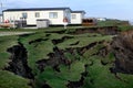 Fast eroding clay cliffs on east coast of yorkshire, UK. Royalty Free Stock Photo