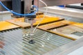 Fast extreme cnc automatic waterjet cutting machine working with sheet metal Royalty Free Stock Photo