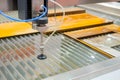 Fast extreme cnc automatic waterjet cutting machine working with sheet metal Royalty Free Stock Photo