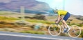 Fast, fitness and a man cycling on the road for cardio, sports or marathon training on a bike. Focus, exercise and a Royalty Free Stock Photo