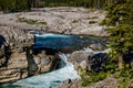 Fast flowing water rushes over the falls. Elbow Falls Provincial Recreation Area, Alberta, Canada