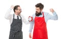 fast food. bearded men with alarm clock. lunch time. catering business. men competition in cooking. chef team in apron Royalty Free Stock Photo