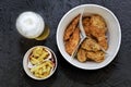 Fast food, Beer, fried chicken legs, wings, nuggets, french frie Royalty Free Stock Photo
