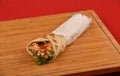 Chicken sandwich, Chapati crispy sandwich, Chicken roll wrap sandwich, on wooden board