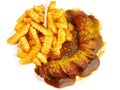 Fast Food - Curry Sausage with French Fries Royalty Free Stock Photo