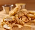 Fast food fried chicken strips close up