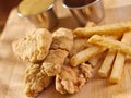 Fast food fried chicken strips close up