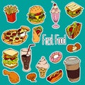 Fast food stickers set on blue background. Vector hamburger, pizza, soda, french fries, hot dogs, ice cream, donut