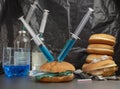 Fast food harm concept, hamburger with plastic waste inside