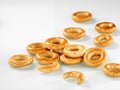 Fast food. Heap of crispy pretzels for breakfast on white background Royalty Free Stock Photo
