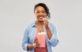 Happy african american woman eating popcorn Royalty Free Stock Photo