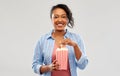 Happy african american woman eating popcorn Royalty Free Stock Photo