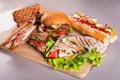 Fast food plate with burger hot dog sandwiches chicken wrap Royalty Free Stock Photo