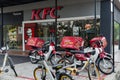 Fast food restaurant KFC view from the street, motorbike delivery service