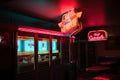 fast food restaurant with neon and retro signage, creating a fun and welcoming atmosphere