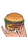 A fast food restaurant offering a burger. Delivery of delicious and hot food at your fingertips. Womans hands holding a