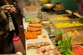 Fast-food restaurant stall with meat dishes and grilled seafood