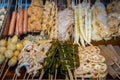 Fast food on sticks on a chinese market Royalty Free Stock Photo