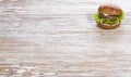 Fast food on wooden table. hamburger on natural background