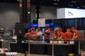 Fast food workers with red t-shirts and caps at McCormick Place